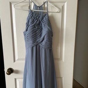 Light blue bridesmaid dress. Skater style sheer in back.